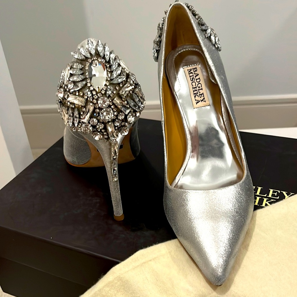 Worn once, indoors. Gorgeous detail on heel.